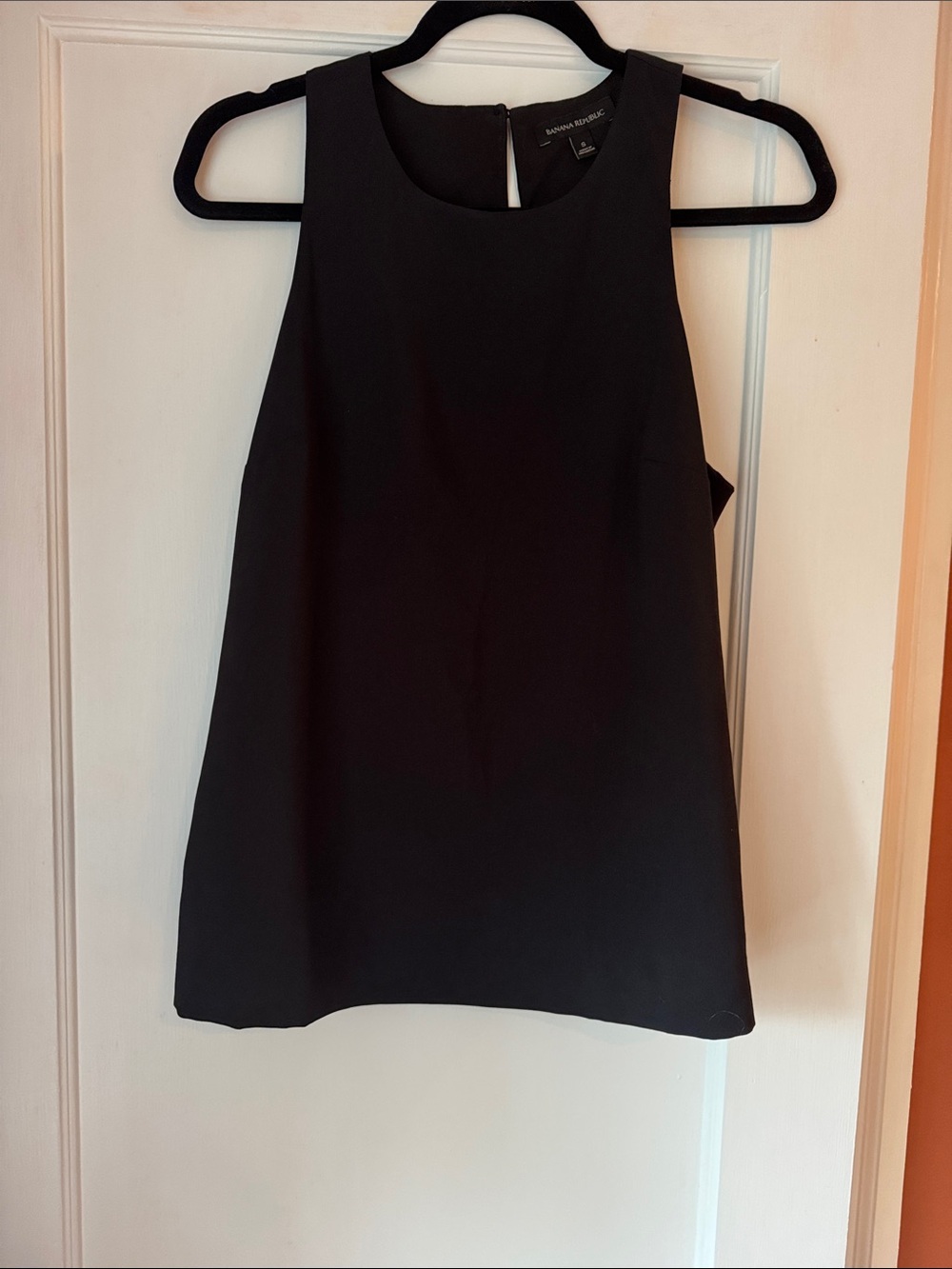Banana Republic Black Sleeveless High-Neck Blouse.